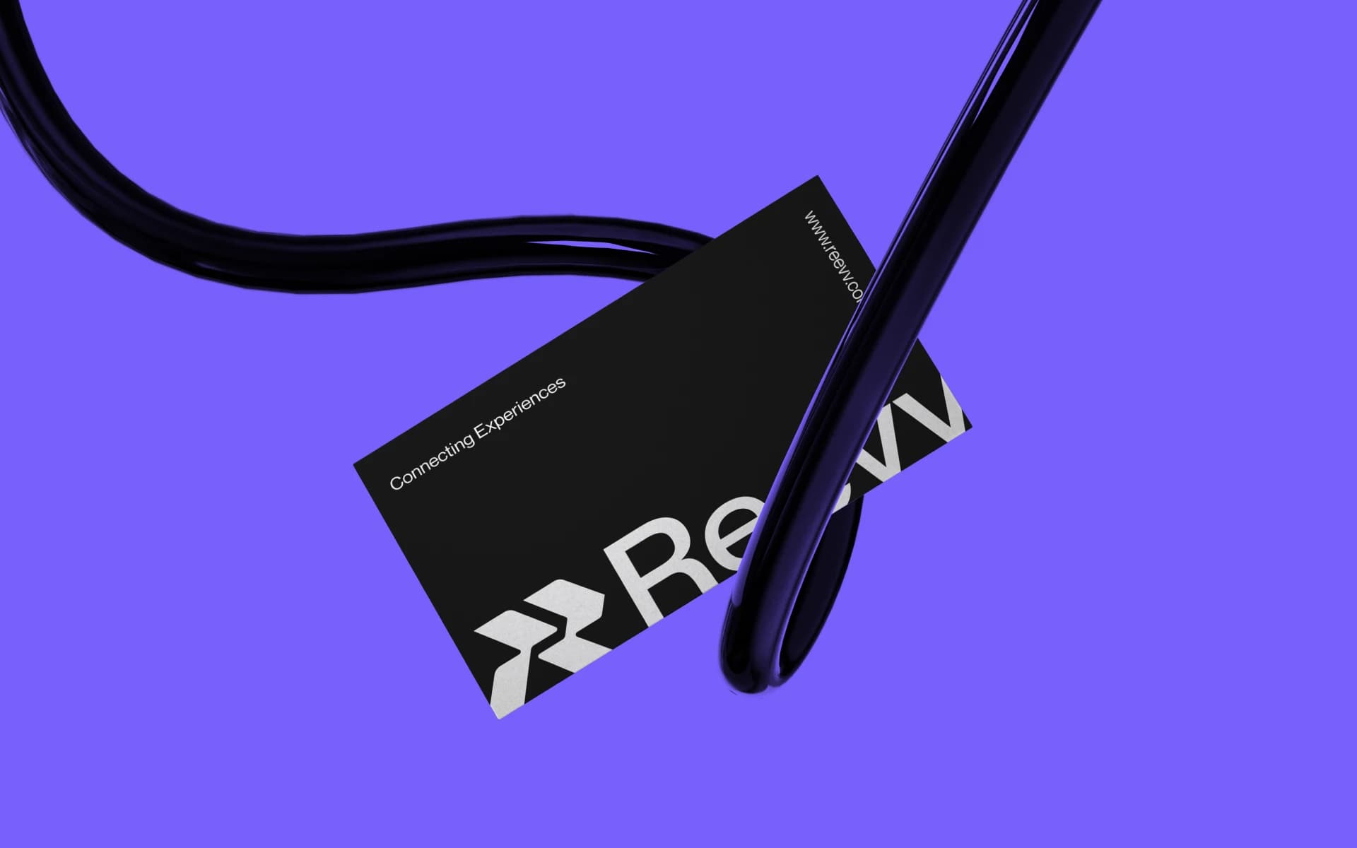 Reevv business card mockup: black card with the Reevv wordmark and 'Connecting Experiences' on a purple background